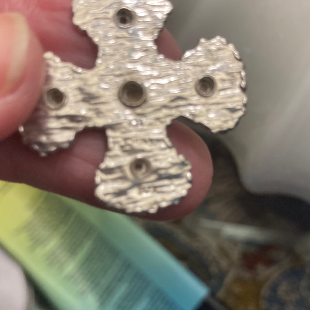 Elegant sterling silver and gold textured cross pendant with sparkling accents. - Picture 4 of 4